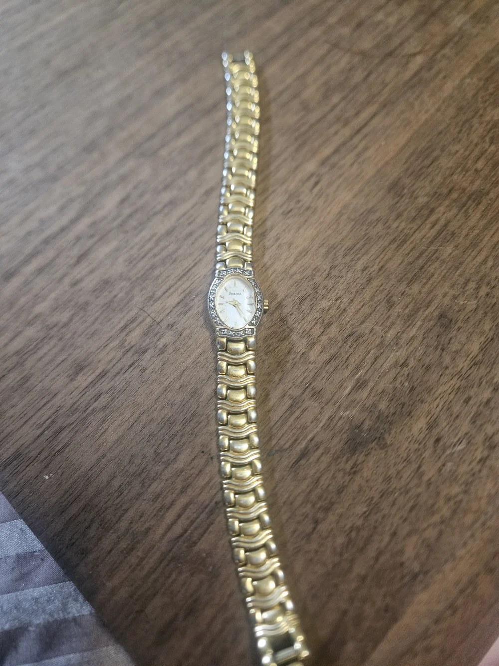 Bulova Vintage Gold Tone Quartz Bracelet Watch Silver X Accent Bezel Pearl Dial